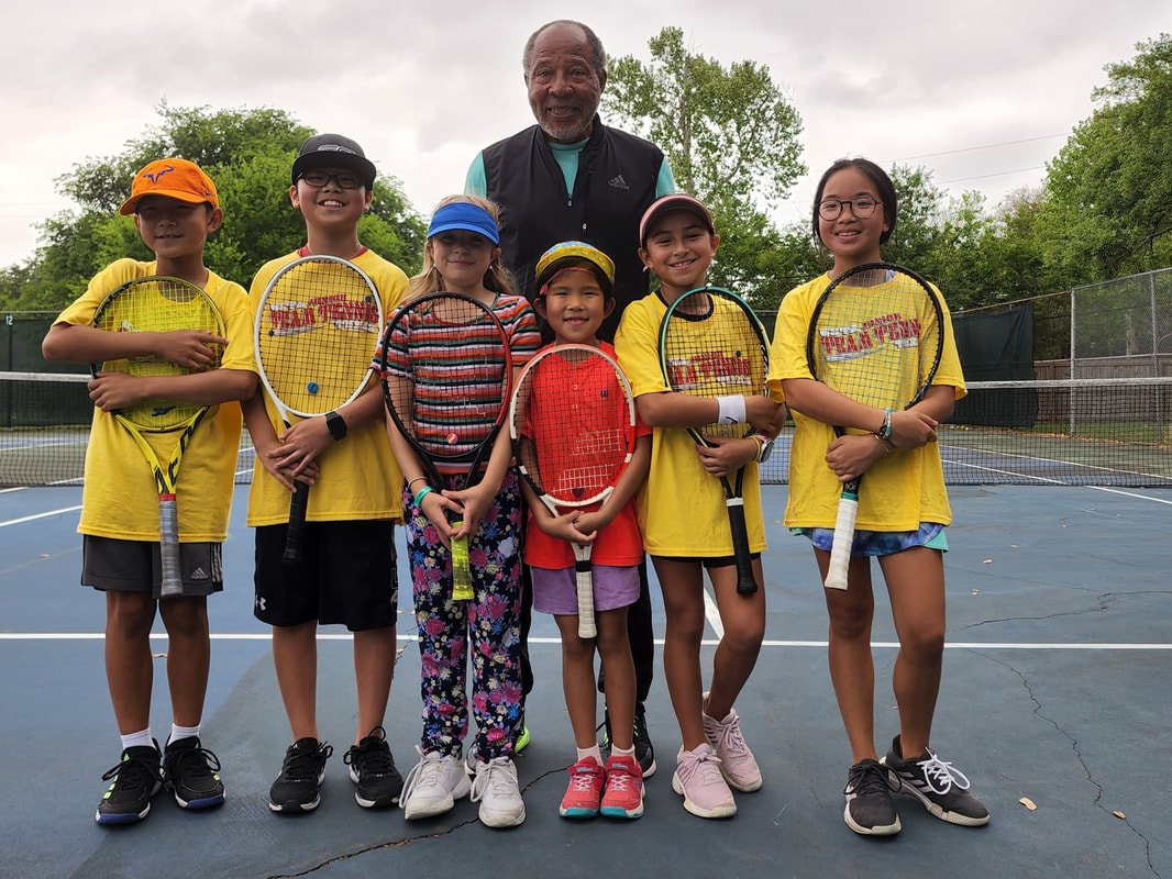 Kids N' Tennis players with trophy
